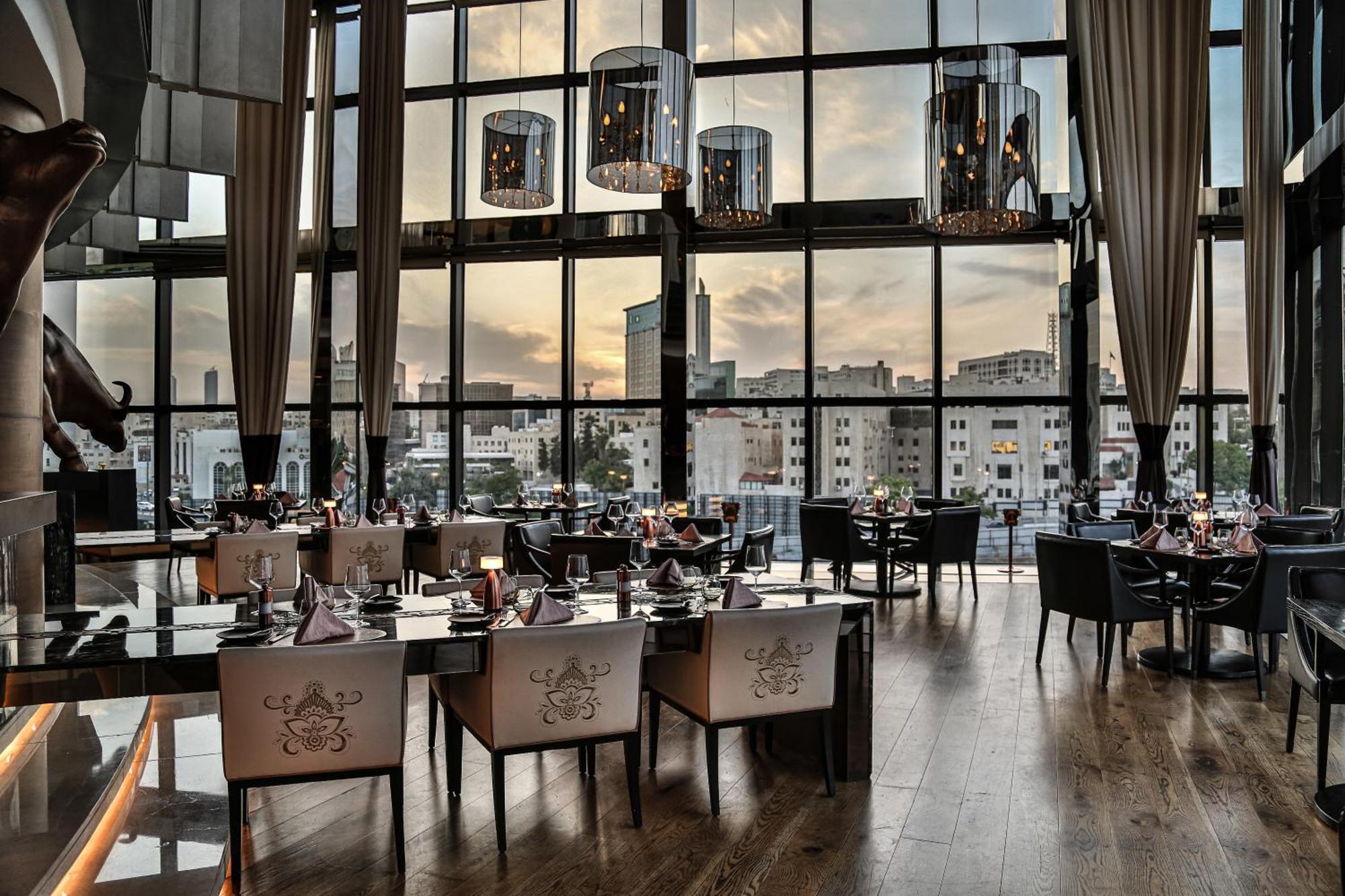 Готель Amman Rotana Екстер'єр фото The restaurant