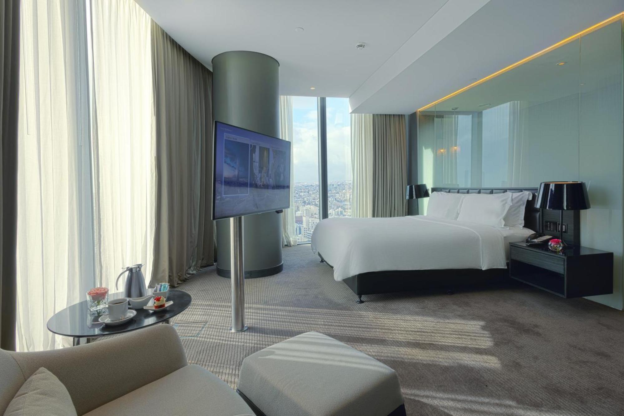 Готель Amman Rotana Екстер'єр фото A bedroom at the hotel